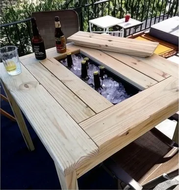 Patio table with a built-in drink cooler